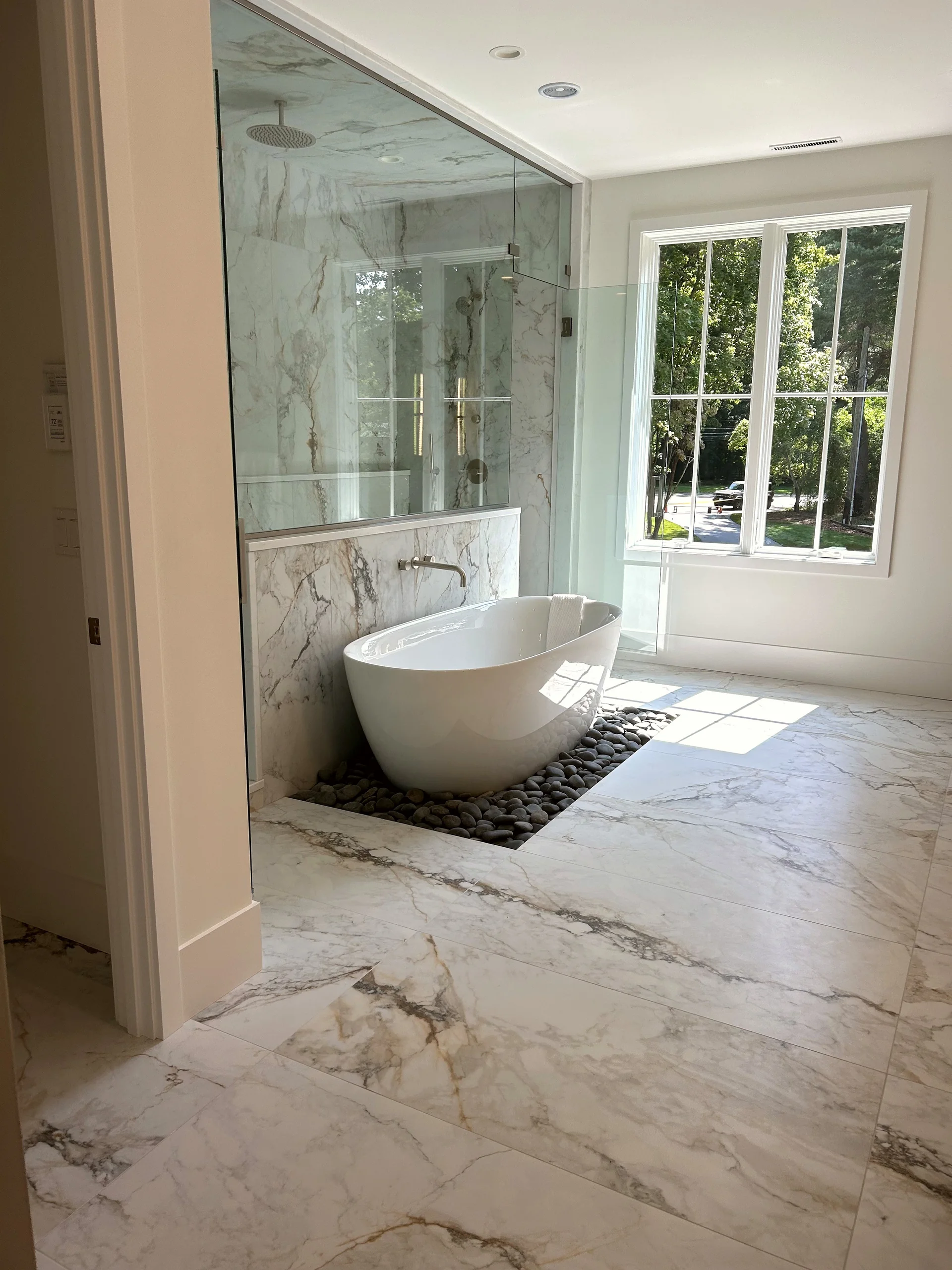 Primary suite at 5 Baldwin Place with vaulted ceiling