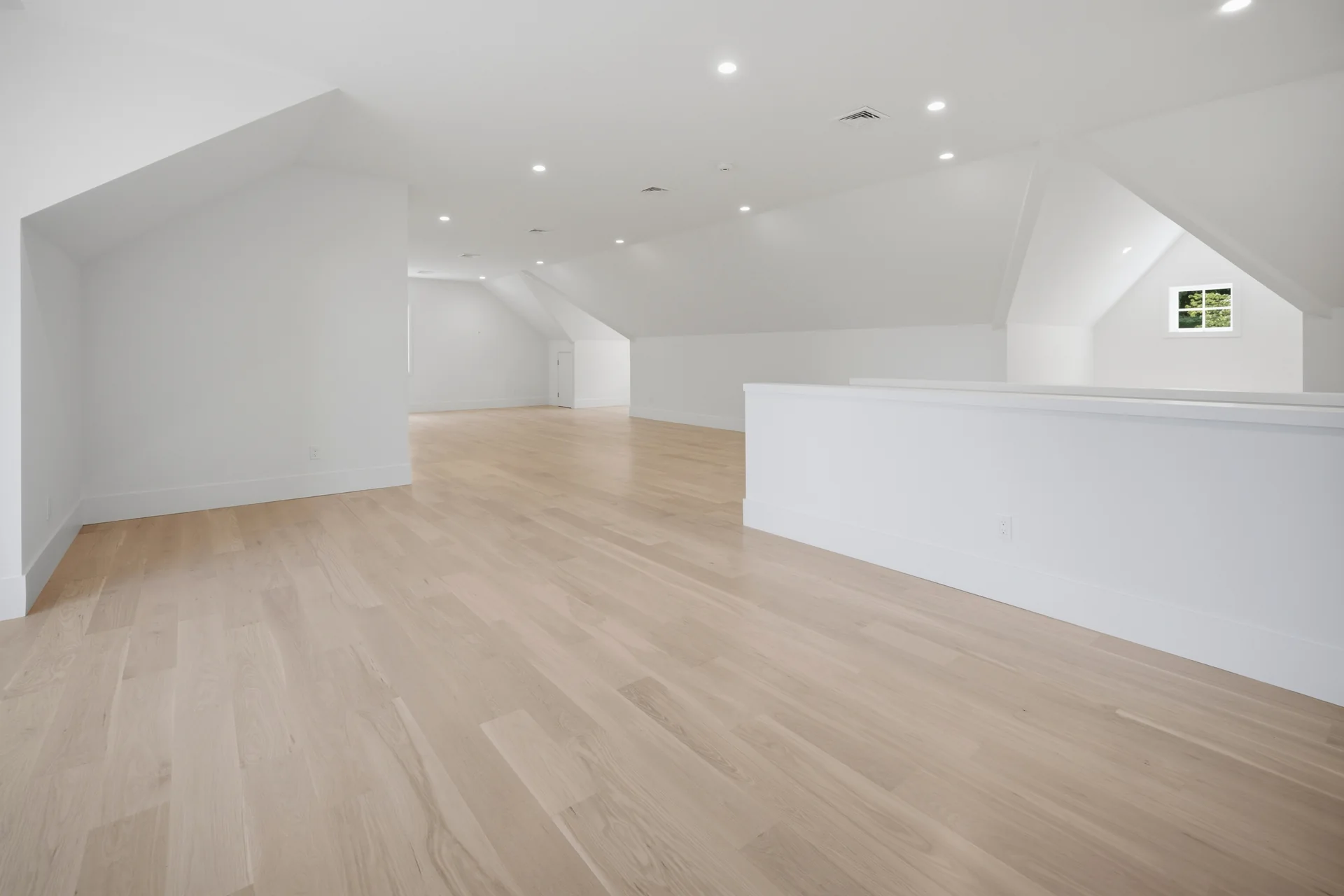 An open, unfinished room in a Westport Family Homes build showing interior wall layout and structural framing