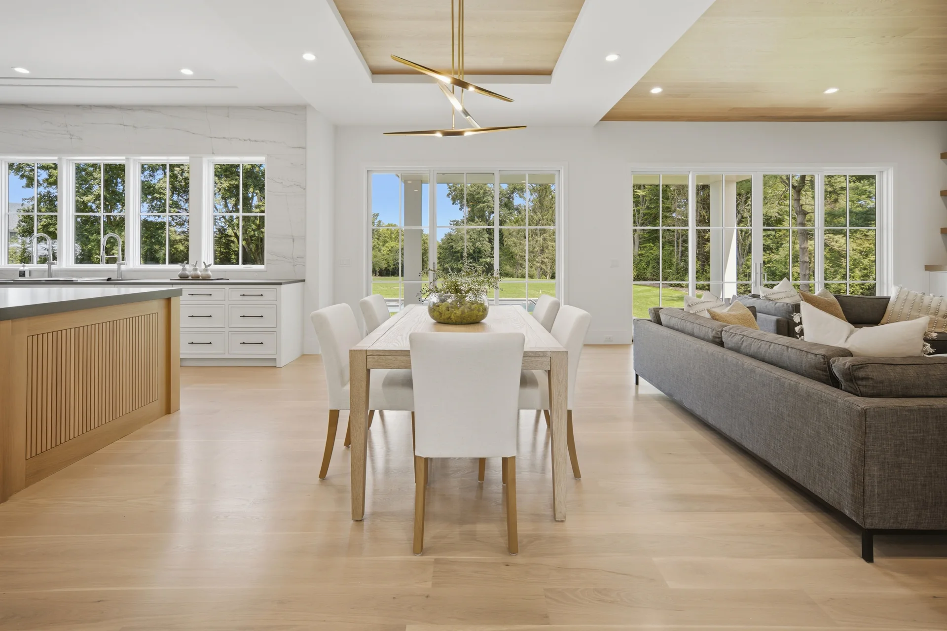 Connected kitchen, dining, and living areas in a Westport Family Homes build
